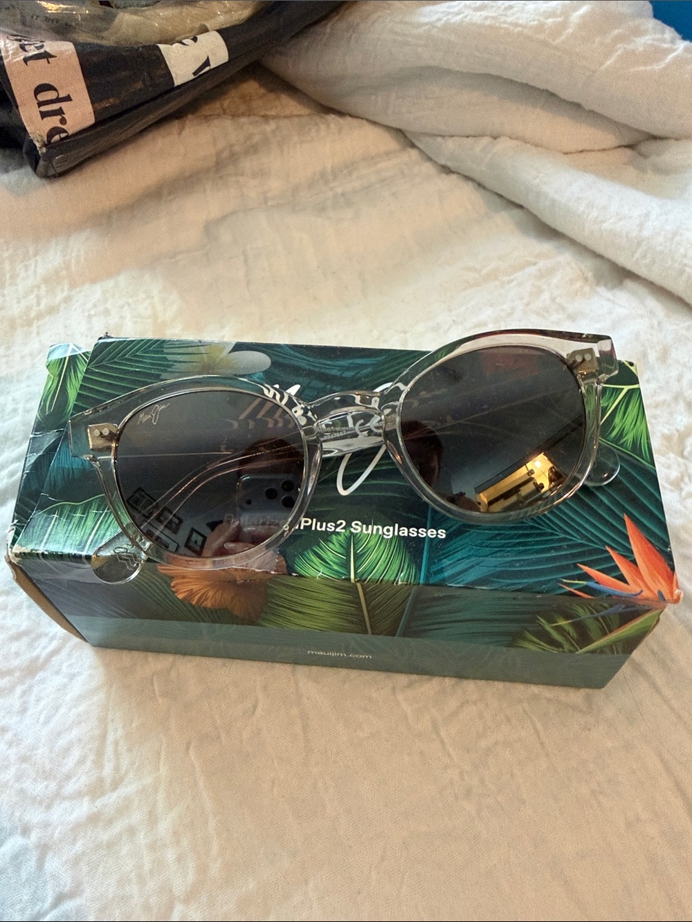 Maui Jim Clear Frame Round Sunglasses with Dark Lenses